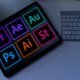 Free and affordable alternatives to Adobe Creative Cloud - image of a notepad, a tablet with the CC logos, and a mouse and keyboard